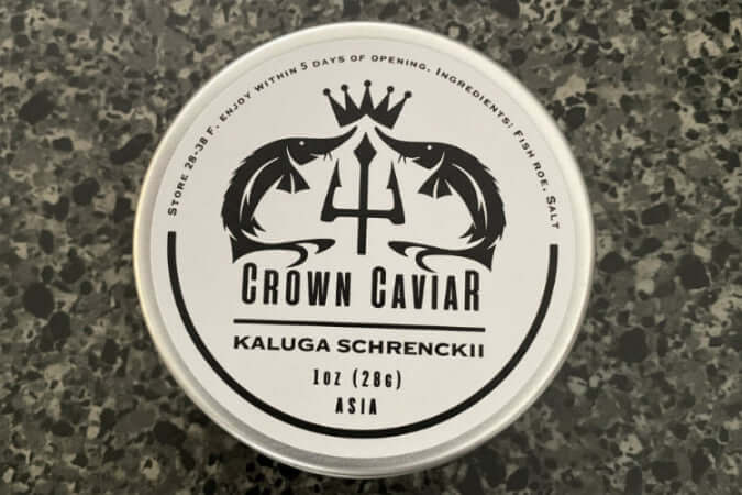 Kaluga hybrid caviar from Crown Caviar in a stylish tin, showcasing premium quality and elegance.