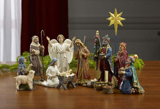 A 15-piece nativity set featuring figures of the Holy Family, the Shepherds, and the Kings following the Christmas Star, with the three wise men bringing gifts of gold, frankincense, and myrrh.