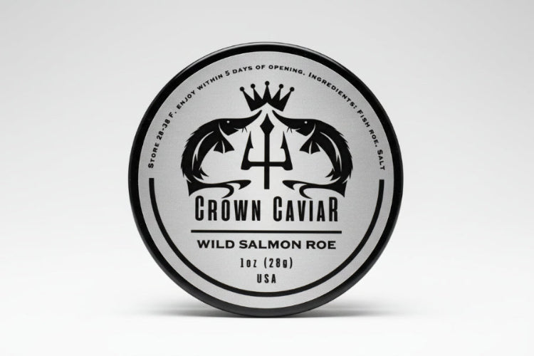 A label of Crown Caviar Wild Salmon Roe, indicating the product is 1 oz (28g) and sourced from the USA.