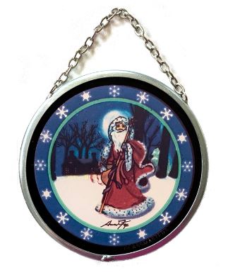 A 3-inch round stained glass Christmas ornament featuring a vintage style illustration of Santa Claus with a sleigh, set against a blue background with snowflakes.