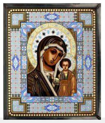 A stained glass window depicting the Kazanskaya Icon of the Virgin Mary, with a depiction of the mother and child in a traditional Russian icon style, surrounded by a blue and white patterned border.