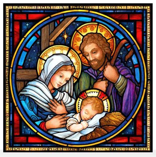 A stained glass panel featuring the Holy Family Nativity with intricate colors and designs.