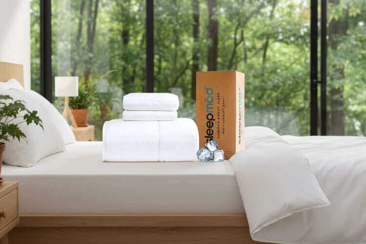 Eucalyptus Bedding Benefits showcased on a cozy bed with white linens and a box of sleep products.