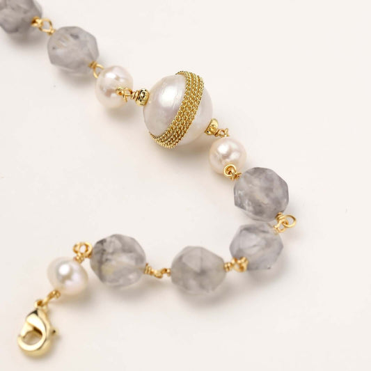 Baroque Pearl Crystal Bracelet featuring luminous baroque pearls and cloud quartz beads on a golden chain.