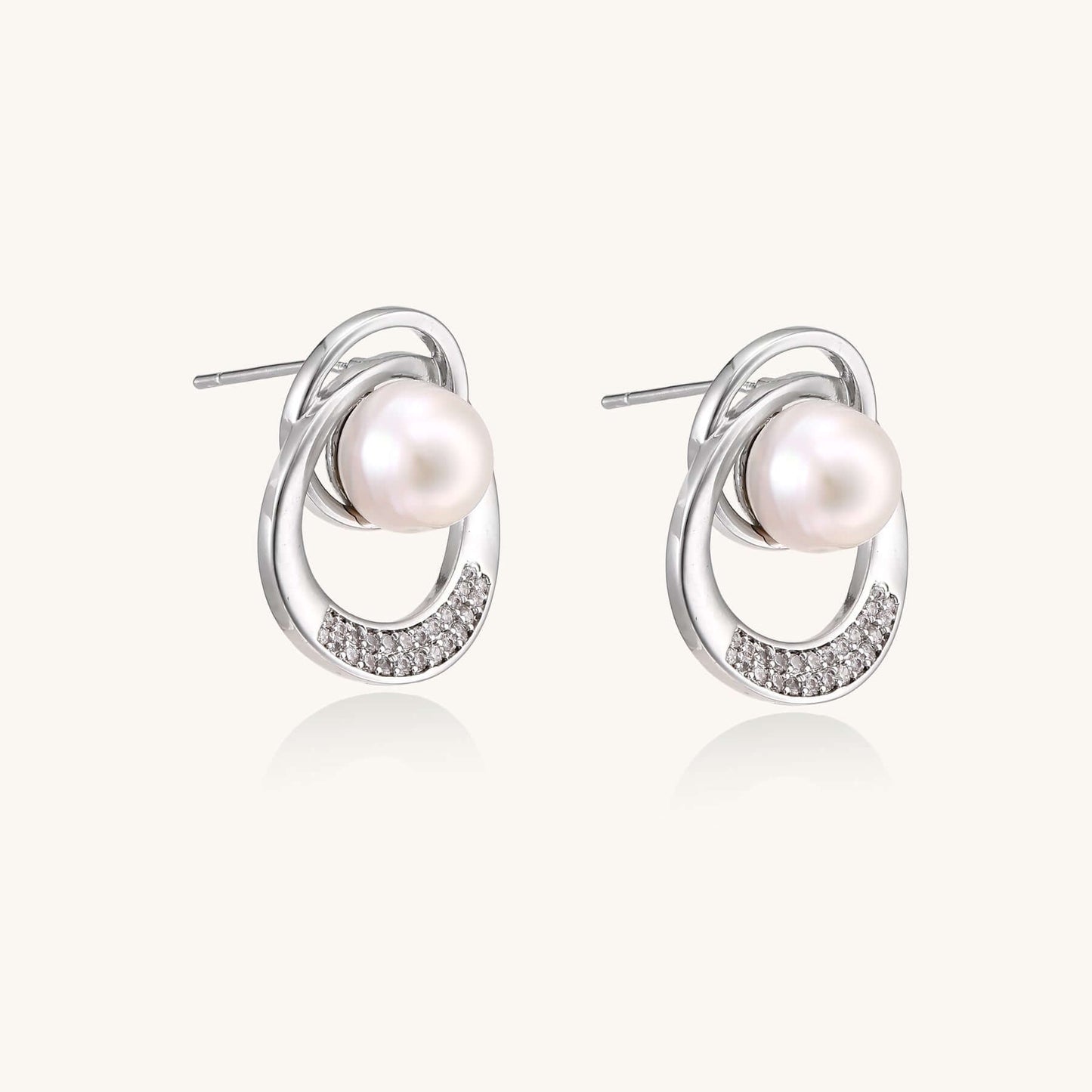 Pearl Orbit Studs - Earrings featuring freshwater pearls and crystal-pavé circles for women's costume jewelry.