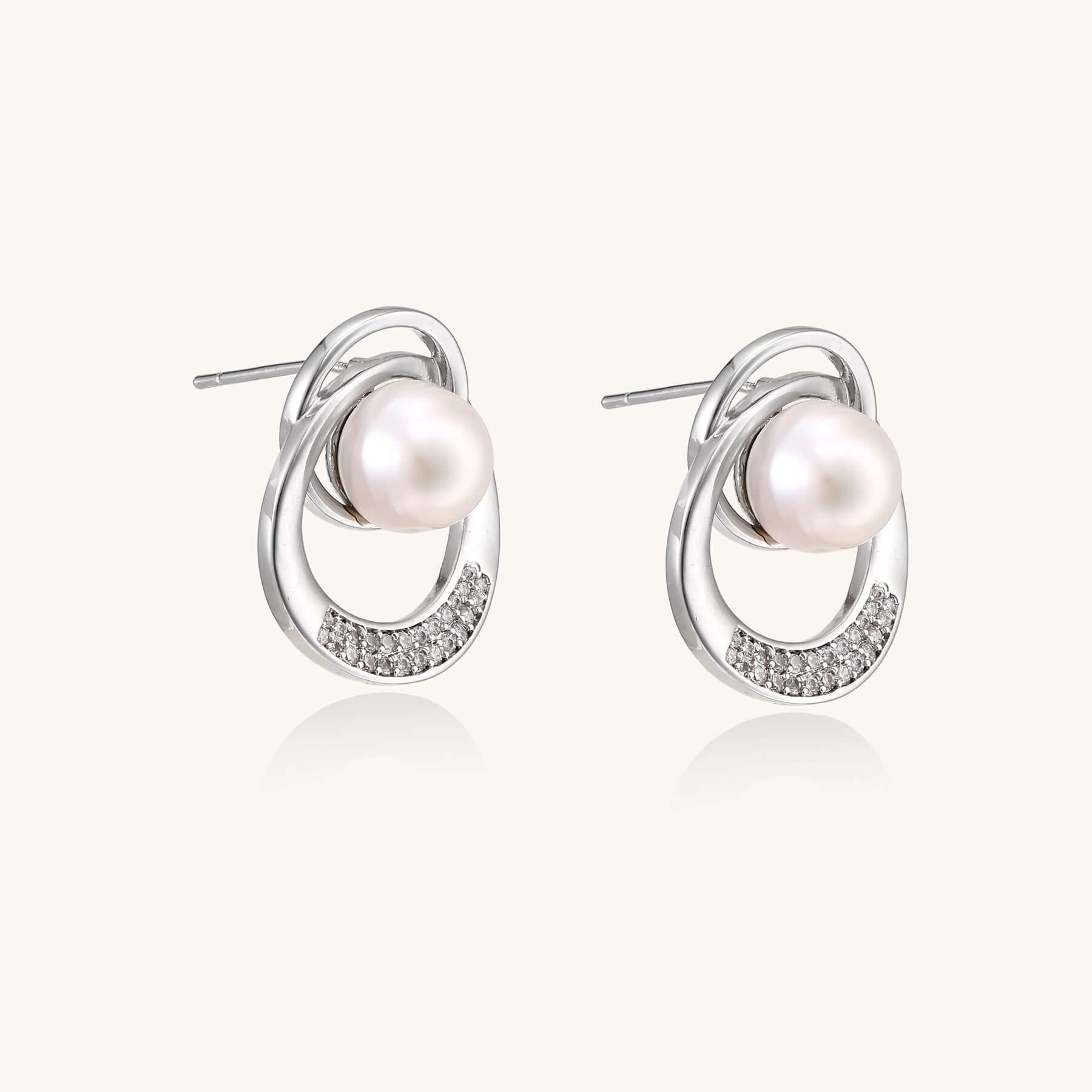 Pearl Orbit Studs - Earrings featuring freshwater pearls and crystal-pavé circles for women's costume jewelry.