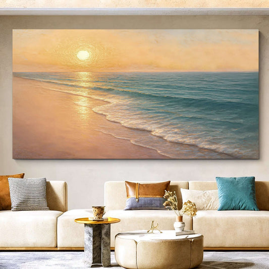 Beach Shoreline Coastal Wall Art IV displayed above a modern living room sofa, showcasing a serene sunset over the ocean.