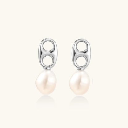 Modern rhodium-plated silver earrings with geometric double-circle design and freshwater pearl drops