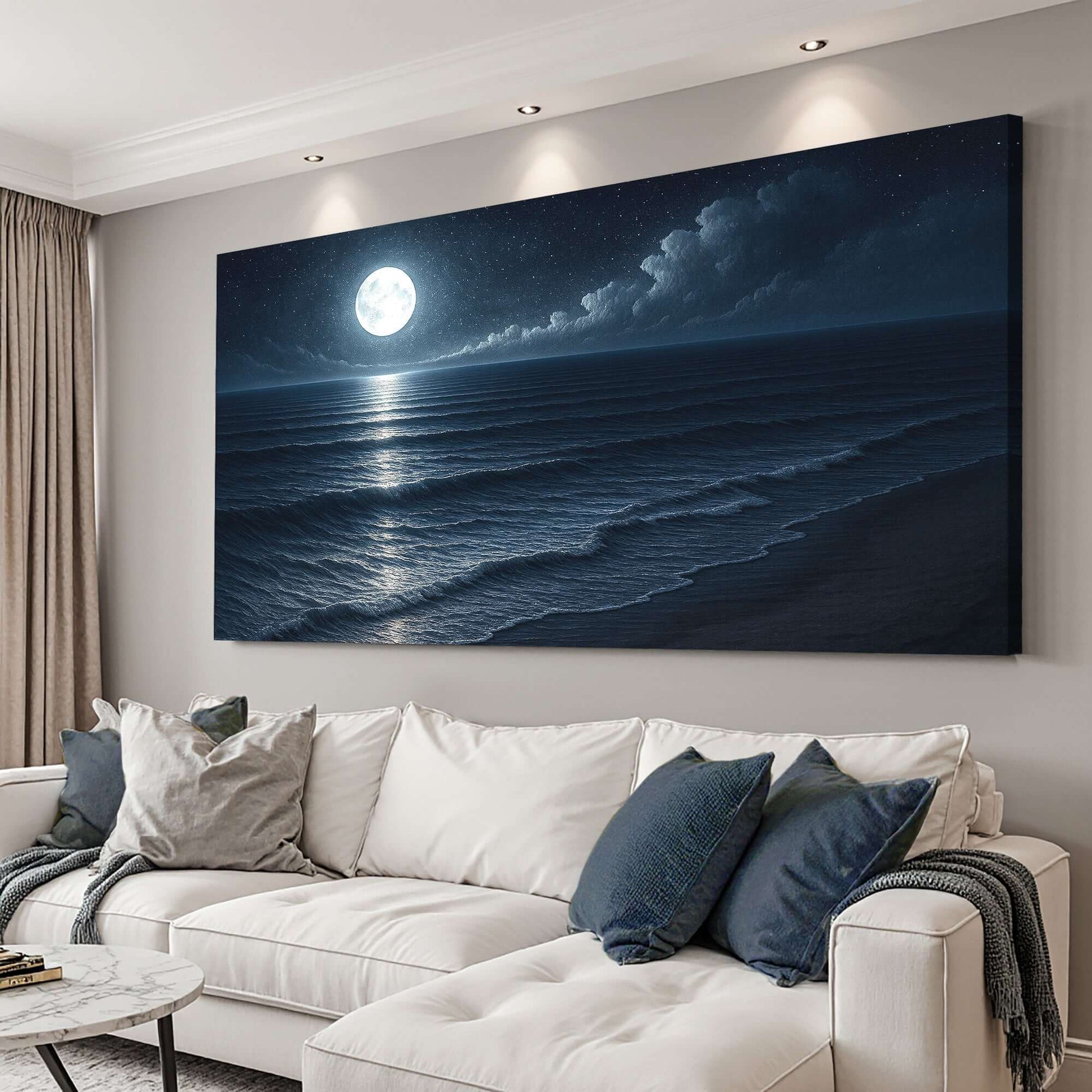 Beach Shoreline Coastal Wall Art featuring a moonlit ocean scene above a cozy sofa.