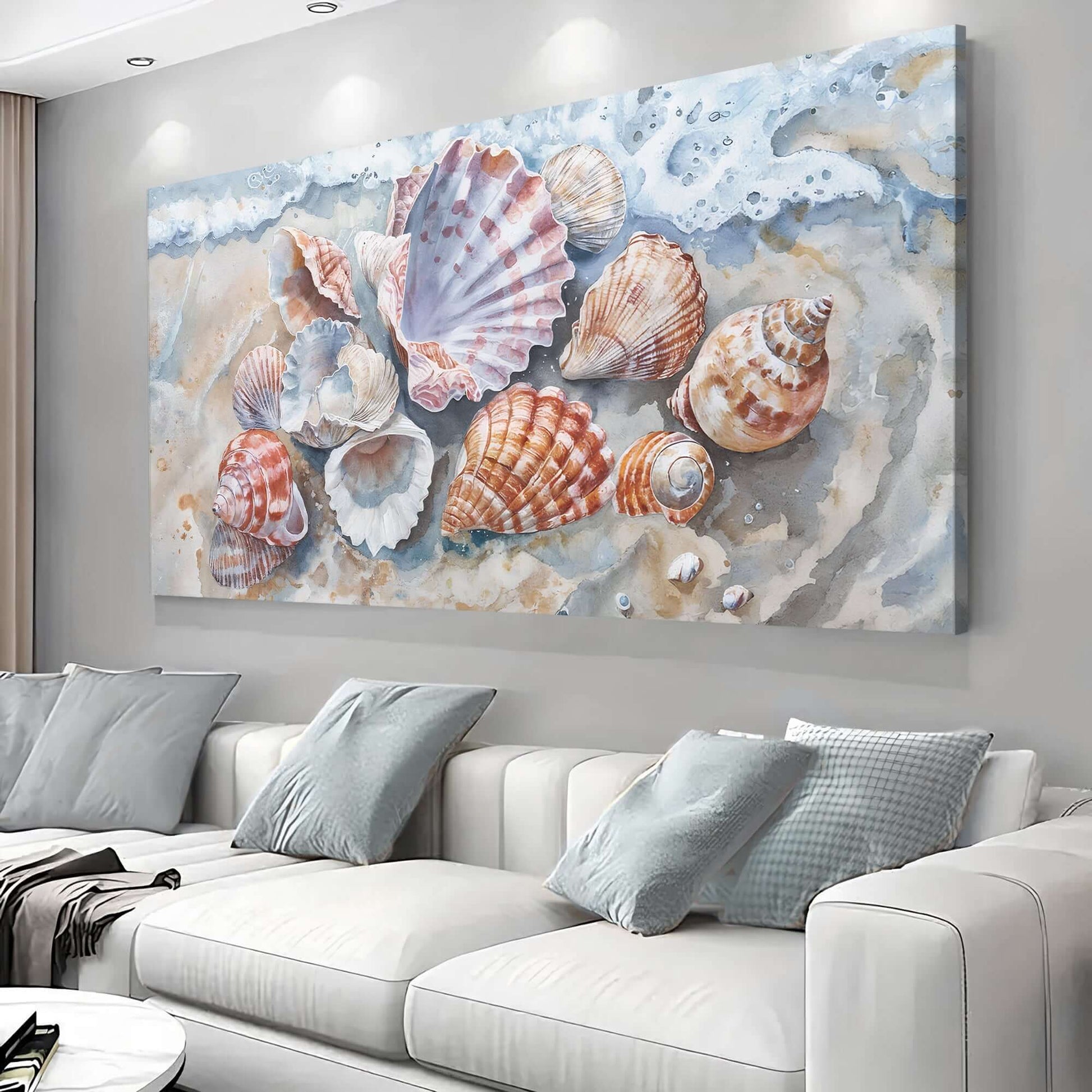 Sea Shells Modern Coastal Wall Art featuring various shells on a sandy beach mural above a modern sofa.