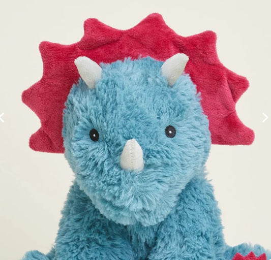 A plush toy resembling a triceratops with a blue body, pink and white accents, and a red spiky crest.