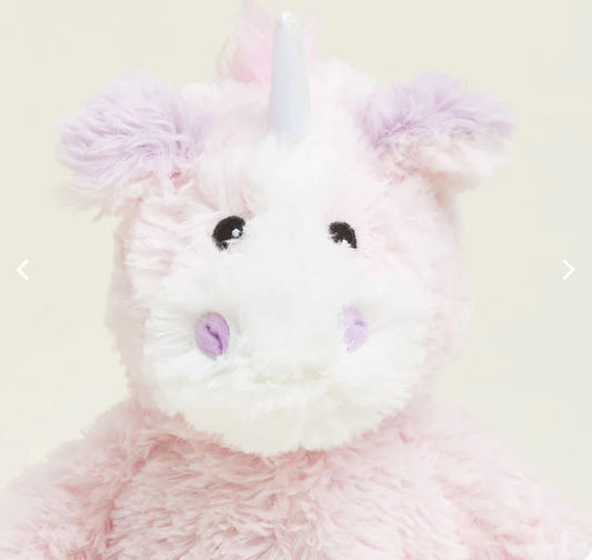 A pink plush unicorn Warmies toy with a soft texture, designed for microwavable comfort and lavender scent.