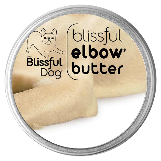 Blissful Elbow Butter for dog care, featuring a tin and a dog's elbow in the background.