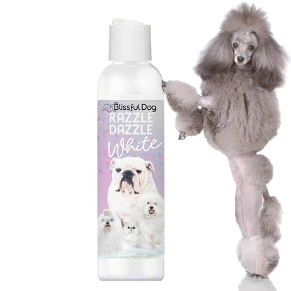 Razzle Dazzle White Pet Shampoo bottle beside a white poodle, highlighting pet grooming and cleanliness.