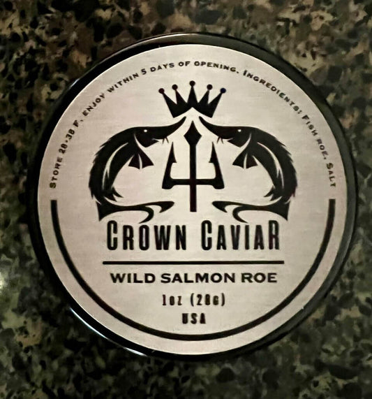 A label of Crown Caviar Wild Salmon Roe, indicating the product is 1 oz (28g) and sourced from the USA.