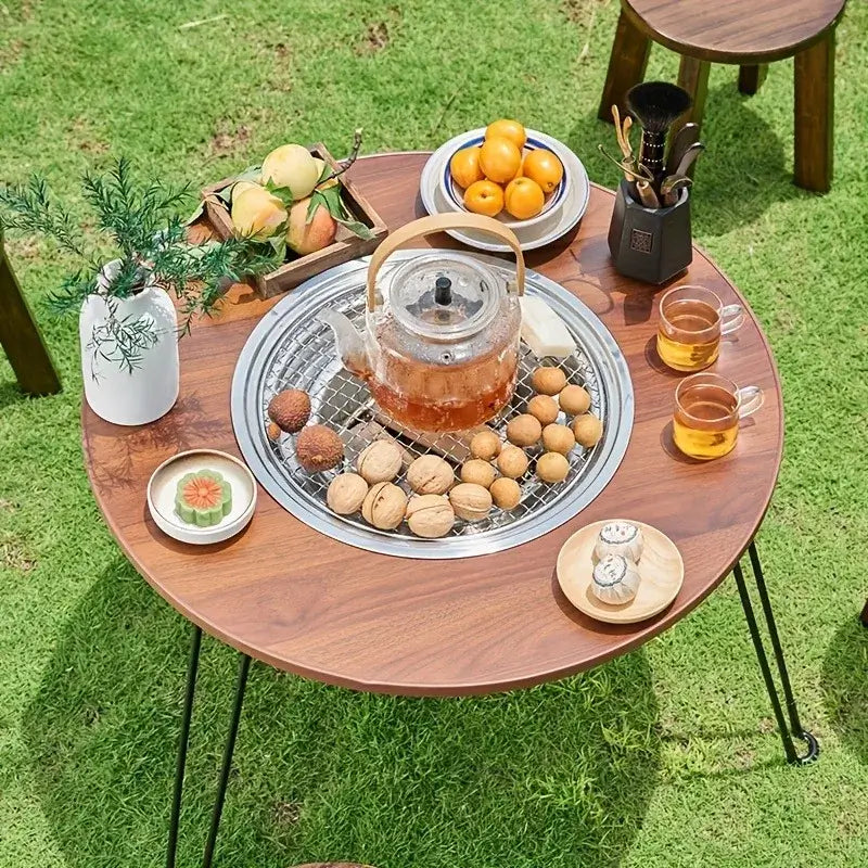 1 Portable Folding Stove Table Camping Round Table for Barbecue Outdoor Picnics Sports Outdoor Barbecue Table with food and drinks.