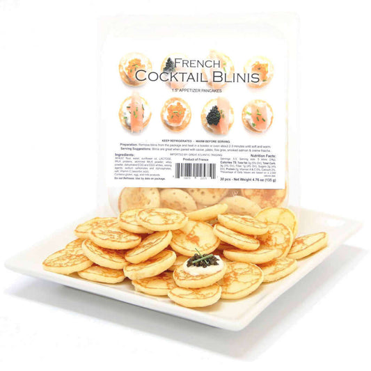 A package of French Cocktail Blinis displayed with multiple mini pancakes visible, intended for serving as an appetizer.