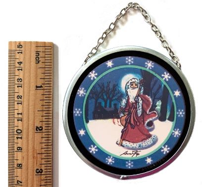 A 3-inch round stained glass Christmas ornament featuring a vintage style illustration of Santa Claus with a sleigh, set against a blue background with snowflakes.