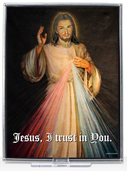 Stained glass panel depicting Jesus Christ with outstretched hands, surrounded by multicolored rays, with the text 'Jesus, I trust in You.' at the bottom.